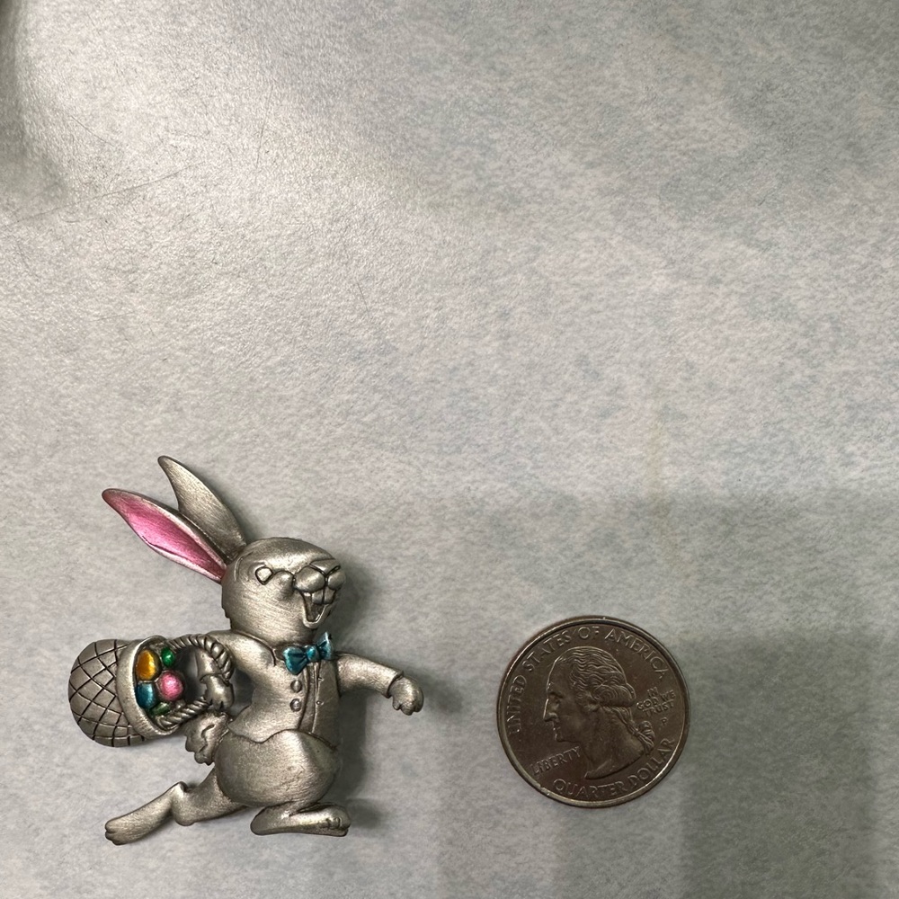 Easter bunny pin with colored eggs in basket. Never worn. Unique.